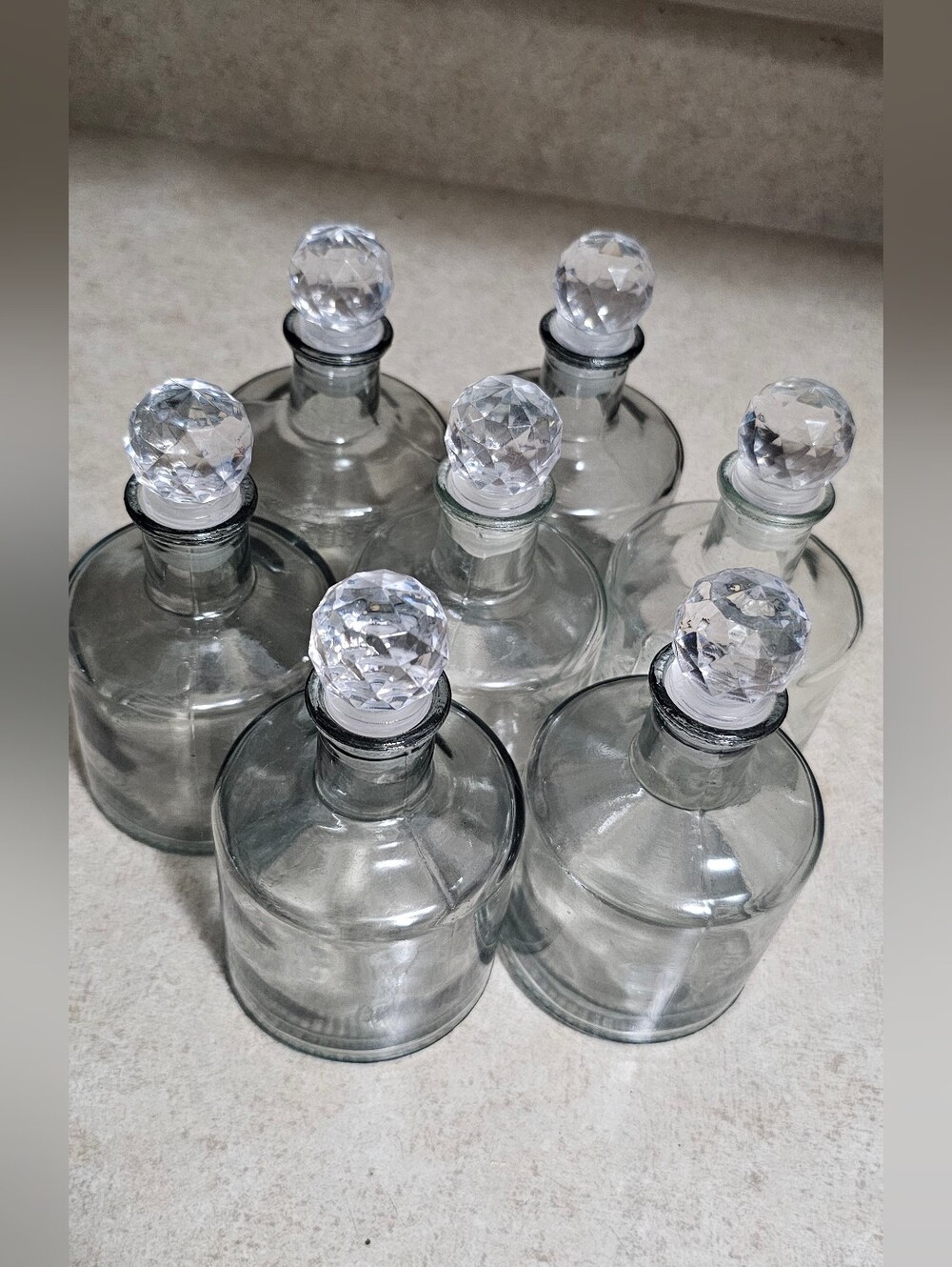 Glass Bottles With Crystal Geometric Stoppers